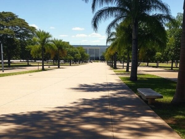 Rua em Brasília com edifícios governamentais e símbolos de inclusão social para pessoas em situação de rua.